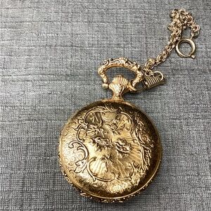 Disney Gold Pocket Wall Clock